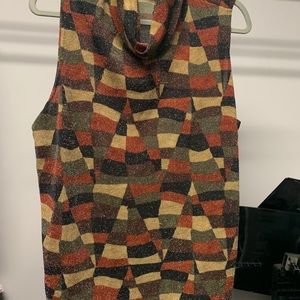 Shimmery sleeveless turtleneck